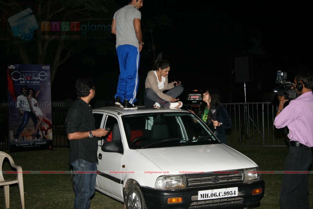 Shahid Genelia on top of a car to promote Chance Pe Dance Event hd photo