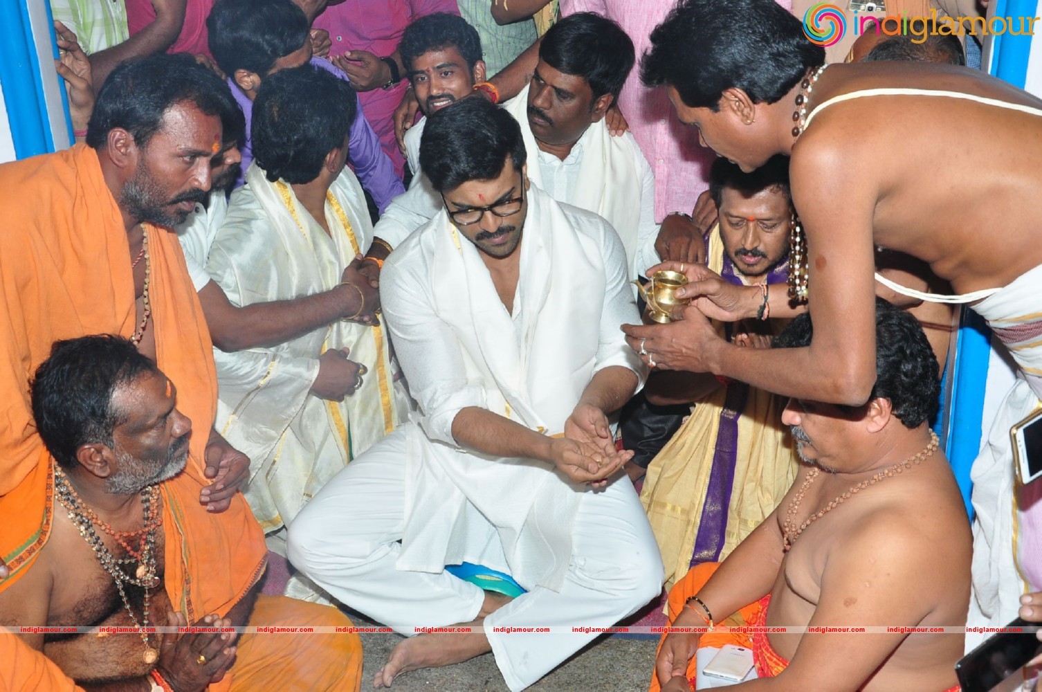 Ram Charan At Chiranjeevi Birthday Celebrations at Filmnagar Temple Event hd photo